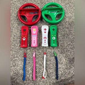 4 wii motes and two steering wheels